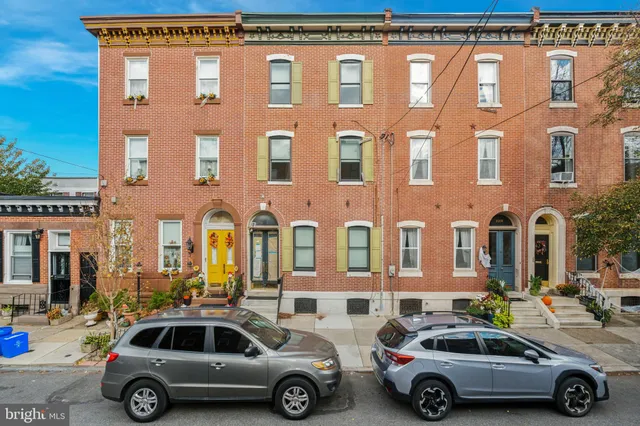 a car parked in front of a building