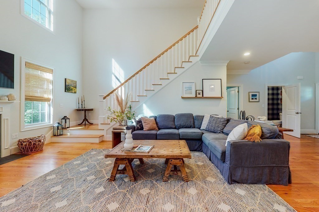 185 Bailey Street Canton, MA 02021 - Photo 14 of 32 a living room with furniture and a large window