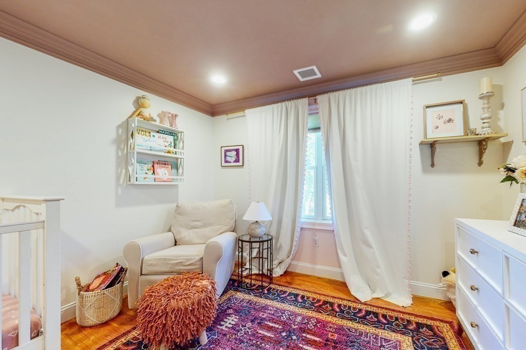 185 Bailey Street Canton, MA 02021 - Photo 18 of 32 a living room with a couch and a table