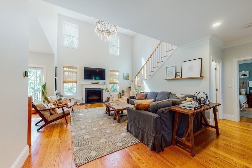 185 Bailey Street Canton, MA 02021 - Photo 24 of 32 a living room with furniture and a flat screen tv