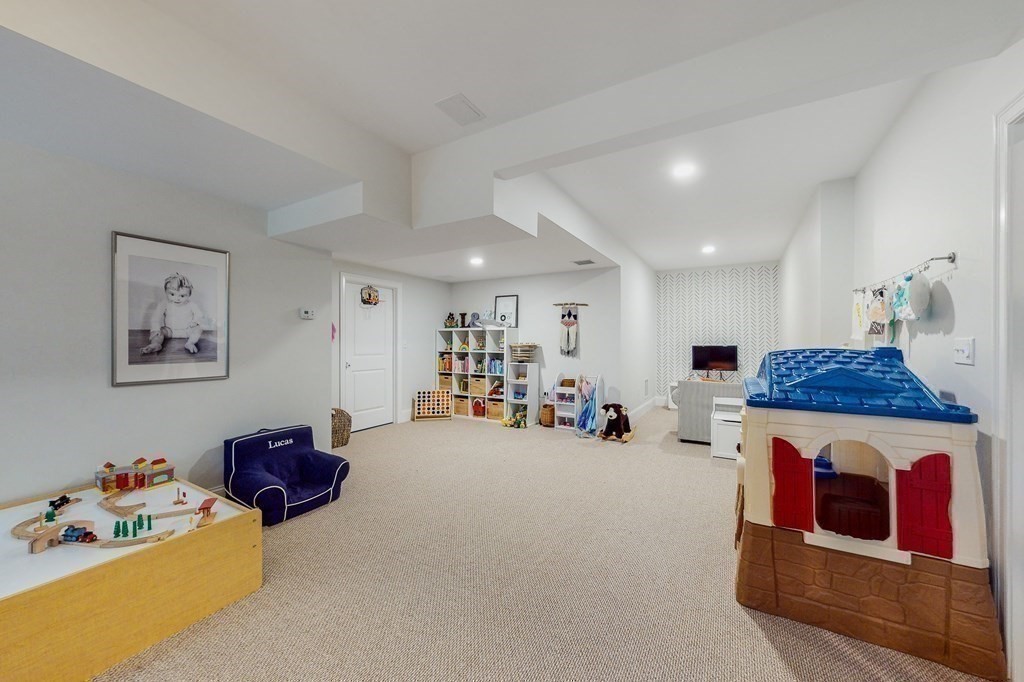 185 Bailey Street Canton, MA 02021 - Photo 30 of 32 a living room with furniture and a couch