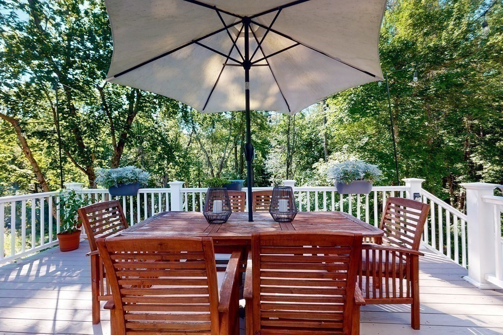 185 Bailey Street Canton, MA 02021 - Photo 9 of 32 a view of a deck with furniture and a backyard