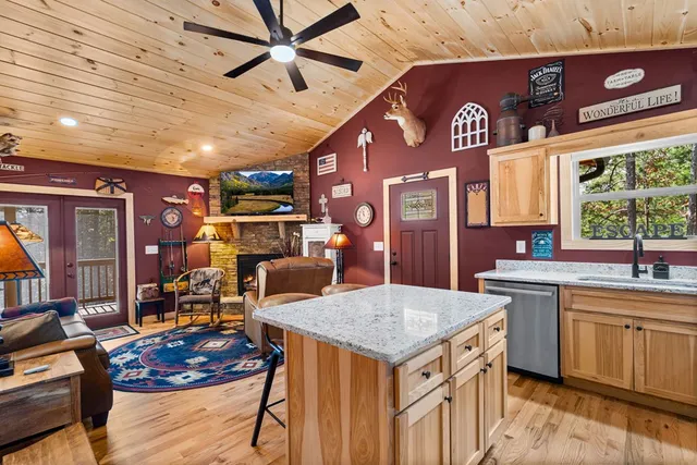a view of a balcony with wooden floor