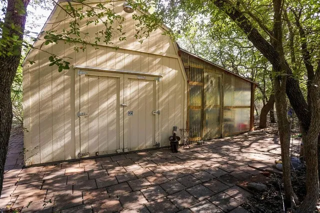 a view of a back yard of the house