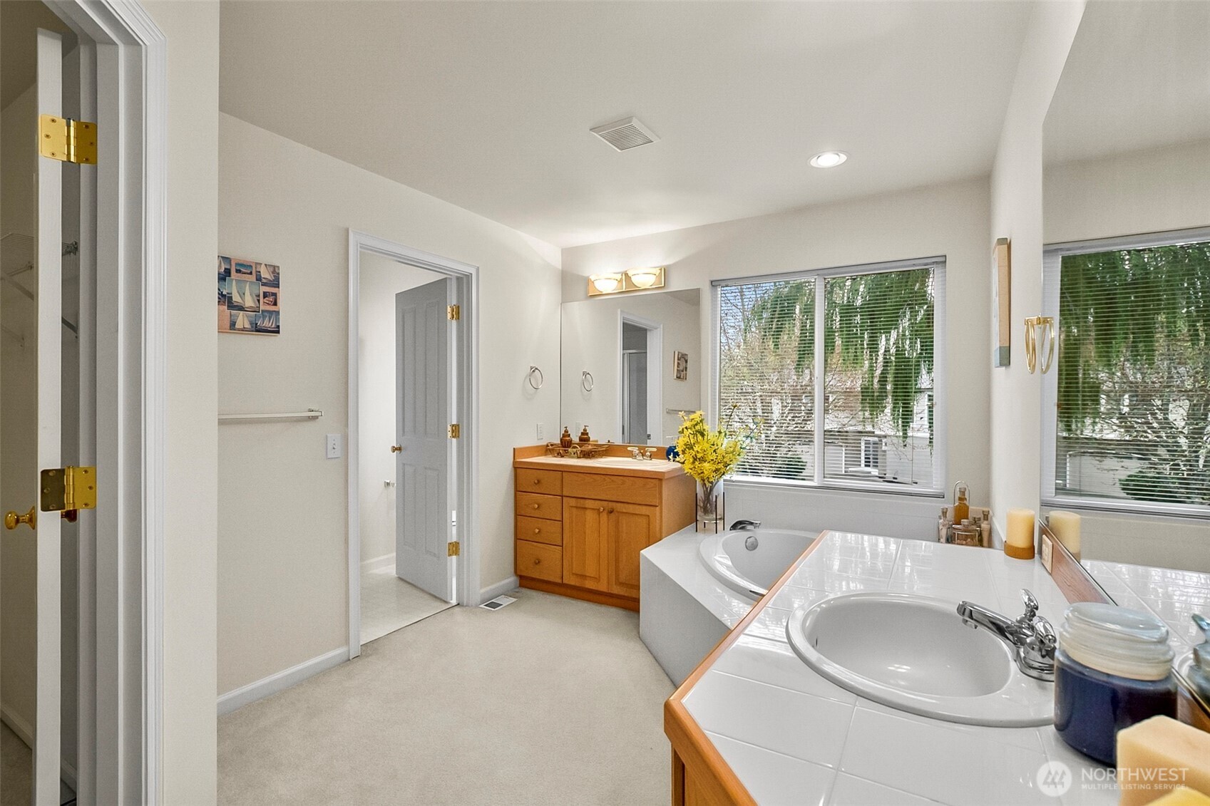 17401 33rd Drive Southeast Bothell, WA 98012 - Photo 27 of 39 a spacious bathroom with a tub sink and mirror