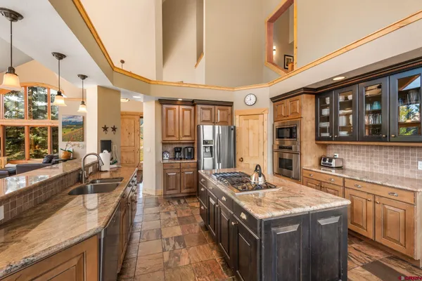 a kitchen with a stove and a sink