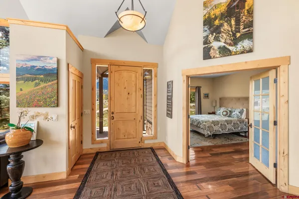 a bedroom with furniture and a window