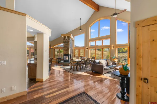 a living room with furniture and a large window