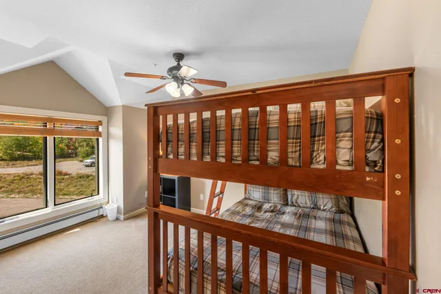 a view of a porch with wooden floor