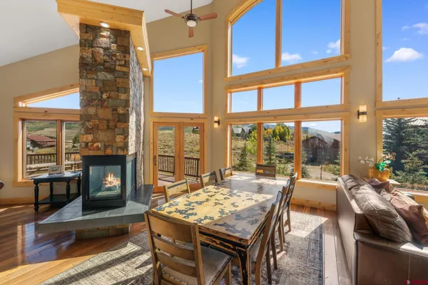 a view of a patio with a table and chairs