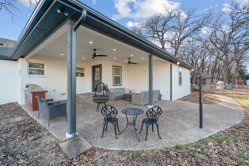1021 Poe Street Azle, TX 76020 - Photo 33 of 38 a view of a dining room with furniture