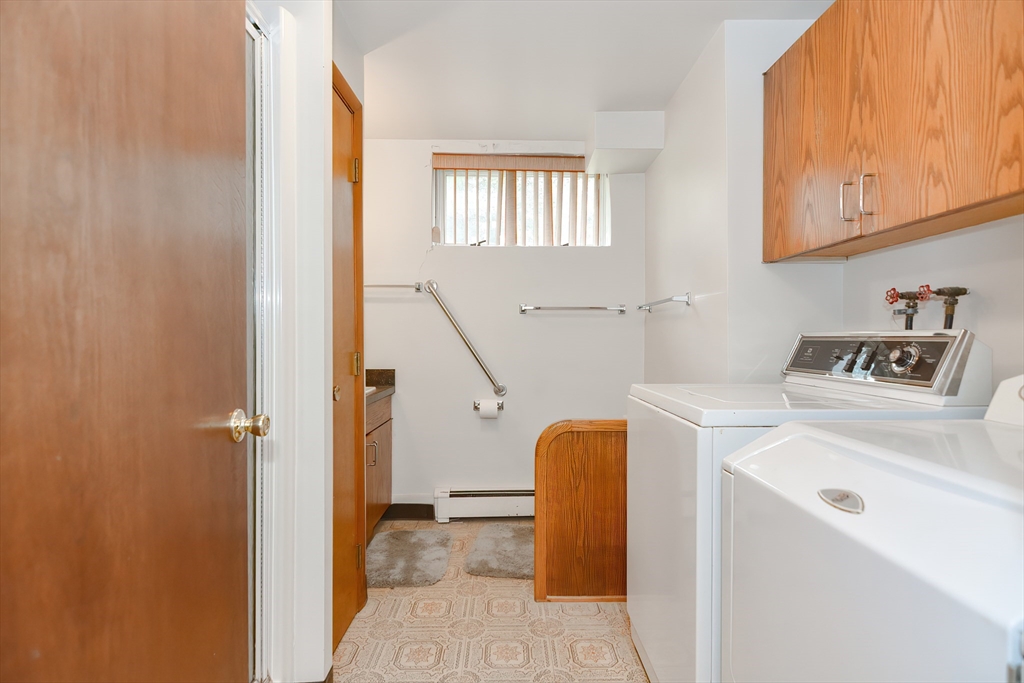 119 Ridge Street Winchester, MA 01890 - Photo 26 of 42 a utility room with dryer and washer