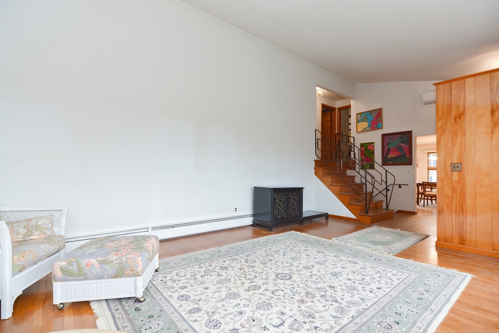 119 Ridge Street Winchester, MA 01890 - Photo 3 of 42 a living room with a couch and a rug