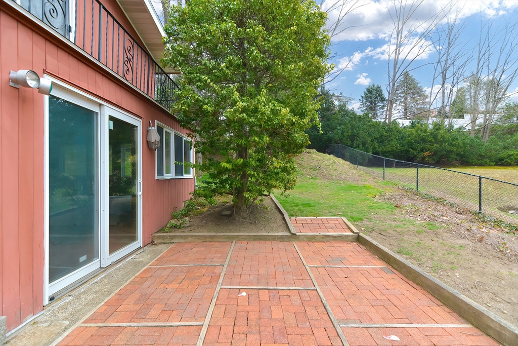 119 Ridge Street Winchester, MA 01890 - Photo 32 of 42 a view of a patio with a yard