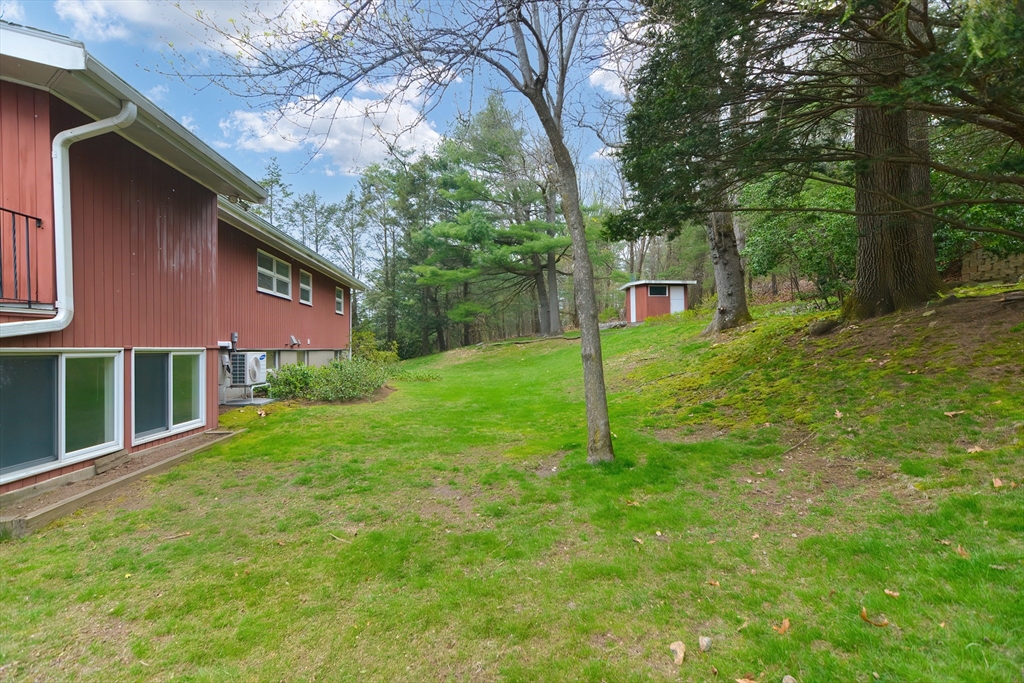 119 Ridge Street Winchester, MA 01890 - Photo 35 of 42 a view of a house with a backyard