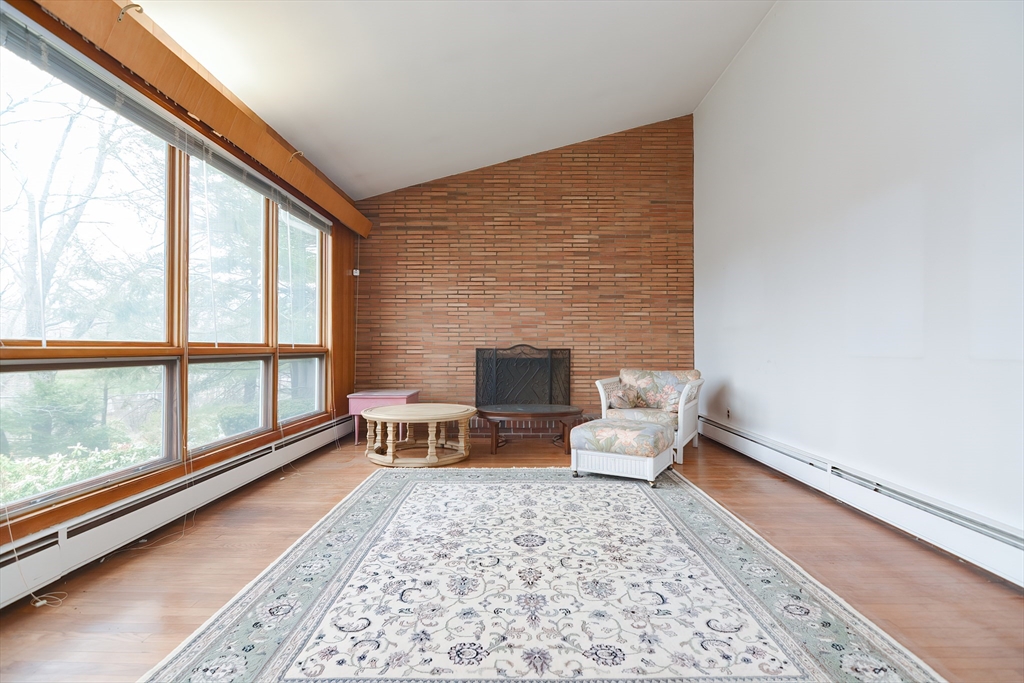 119 Ridge Street Winchester, MA 01890 - Photo 5 of 42 a living room with furniture and a rug