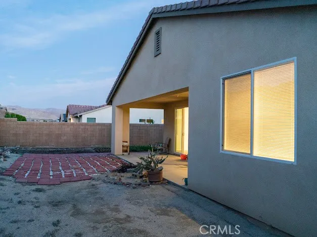 a view of a back yard of the house