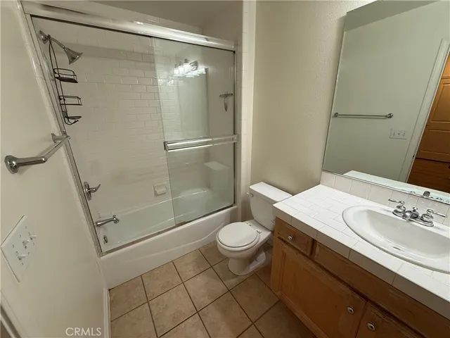 a view of storage and utility room with washer and dryer