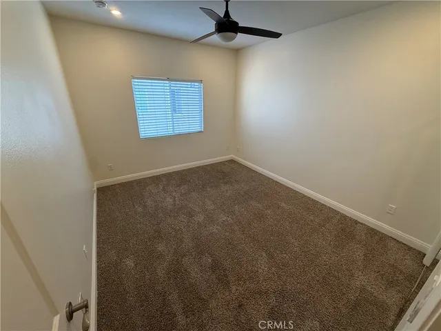wooden floor in a hall with a mirror