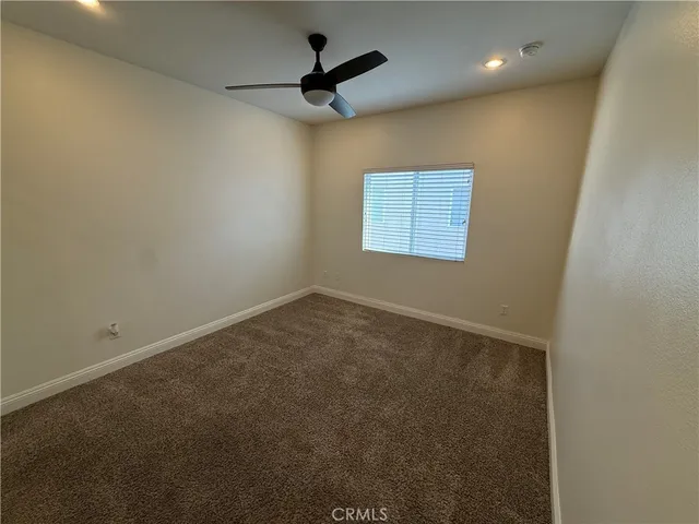 an empty room with a mirror