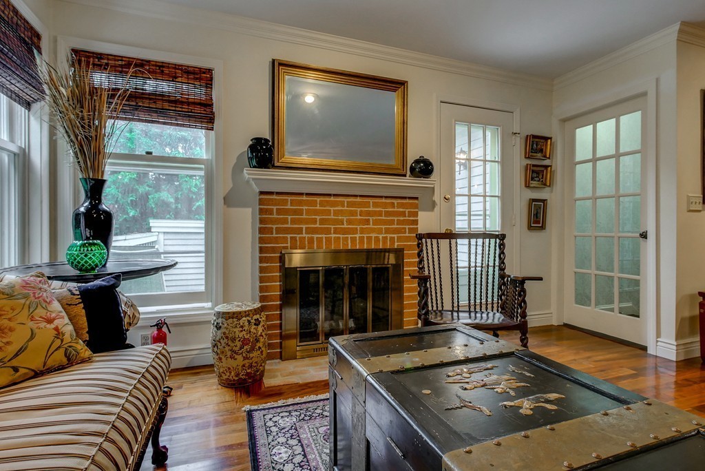13 Wynridge Road, Unit 13 Windham, NH 03087 - Photo 11 of 29 a living room with furniture and a fireplace