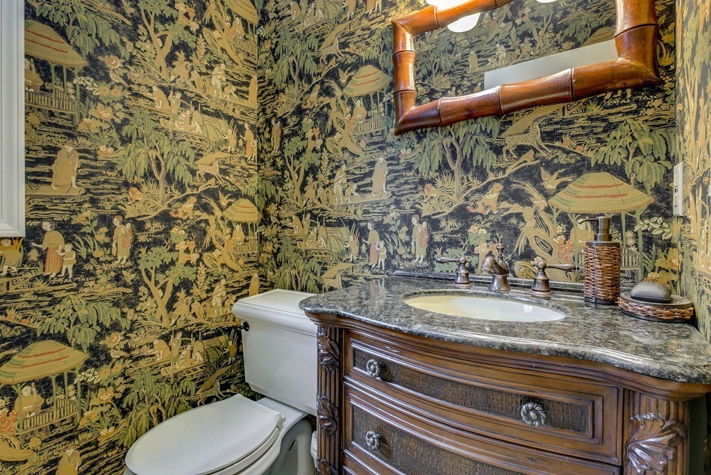 13 Wynridge Road, Unit 13 Windham, NH 03087 - Photo 14 of 29 a bathroom with a granite countertop toilet and a sink