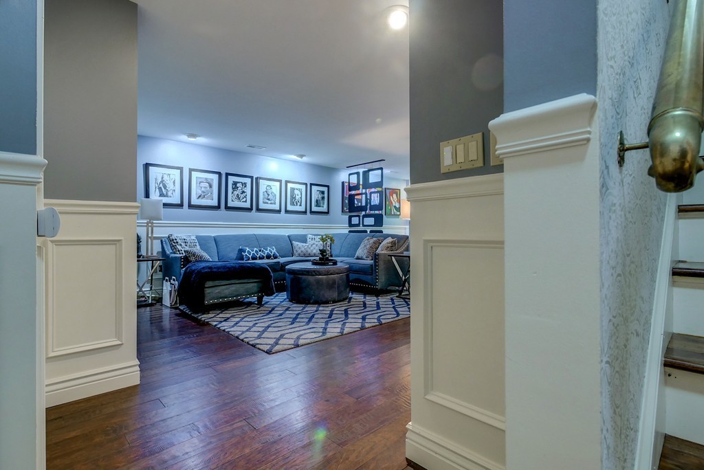 13 Wynridge Road, Unit 13 Windham, NH 03087 - Photo 24 of 29 a living room with furniture and a fireplace
