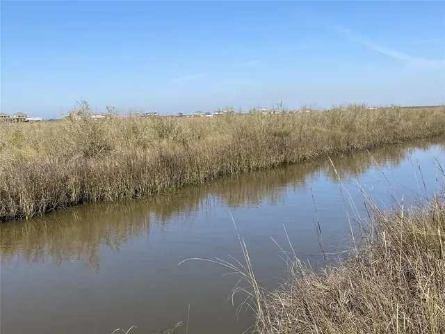 a view of a lake with a city