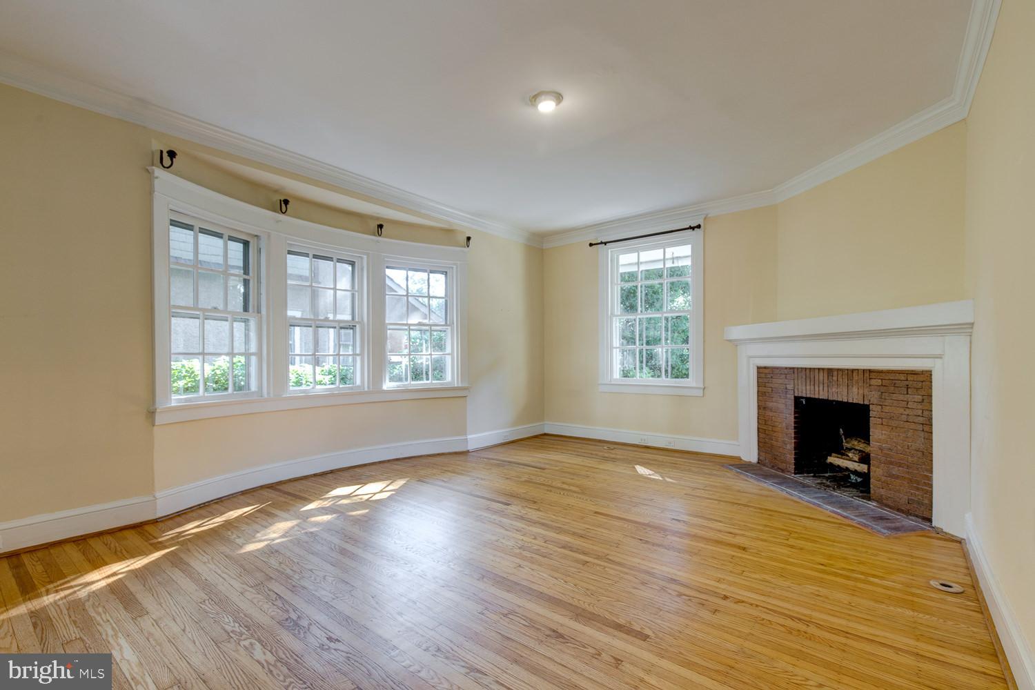228 Poplar Avenue Wayne, PA 19087 - Photo 7 of 32 Living room with bowed windows and FP