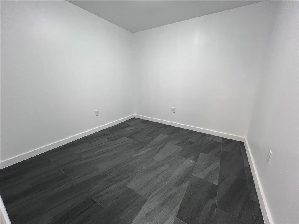 7855 Roswell Road Atlanta, GA 30350 - Photo 6 of 24 a view of an empty room