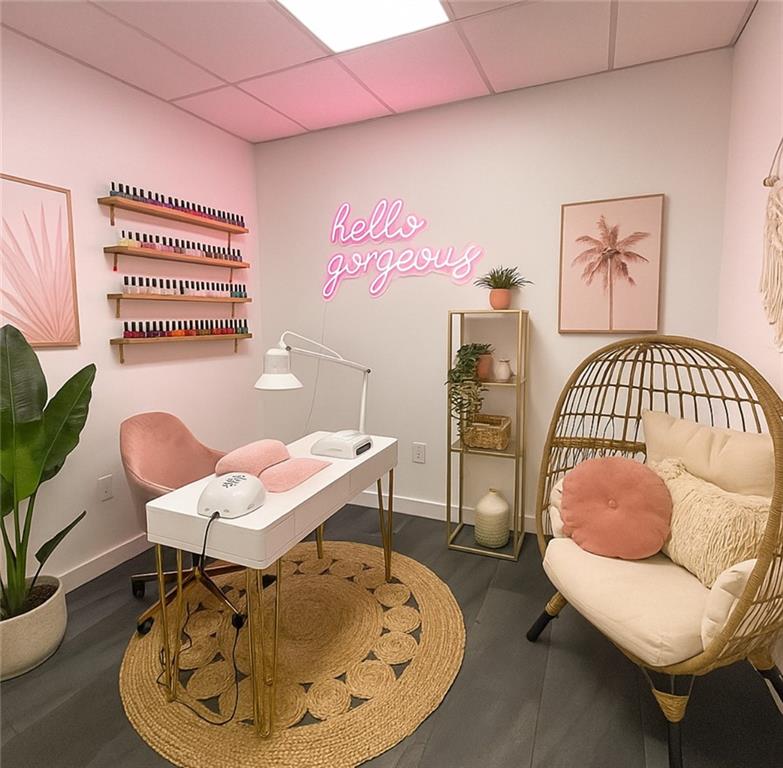 7855 Roswell Road Atlanta, GA 30350 - Photo 7 of 24 a living room with furniture and a wooden floor