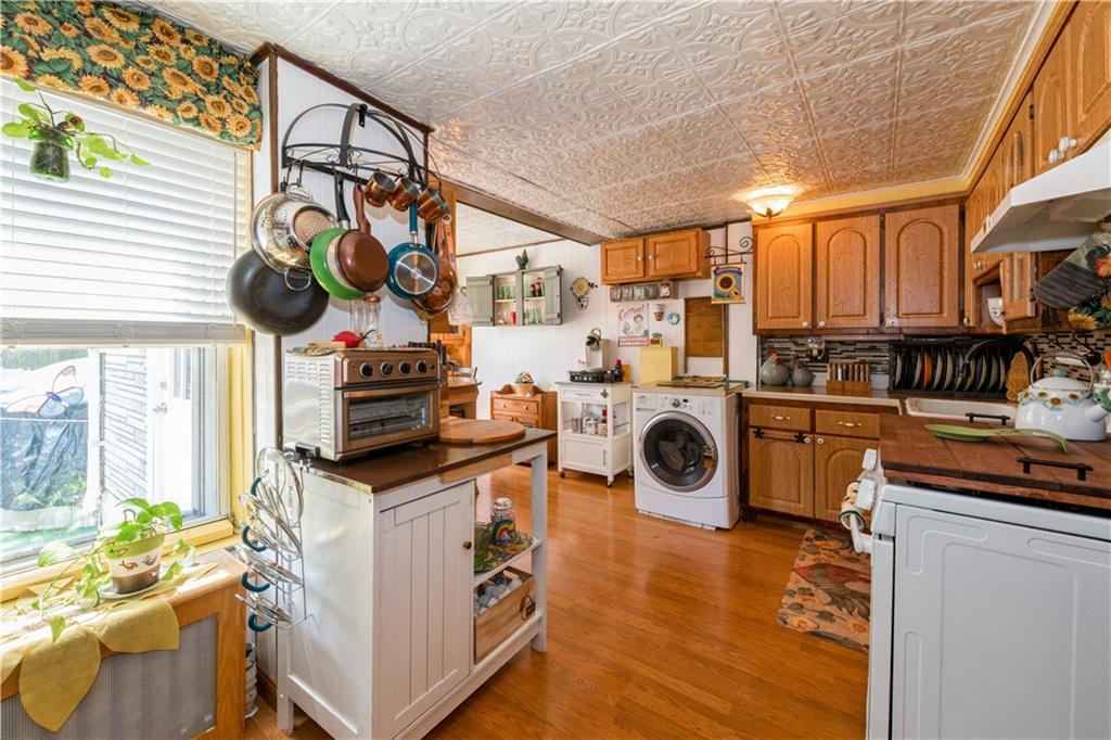 358 74th Street Brooklyn, NY 11209 - Photo 12 of 41 a kitchen with stainless steel appliances granite countertop a stove and a sink