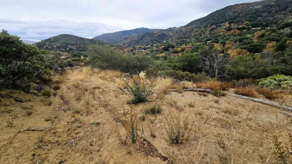 a view of a lake with mountains in the background