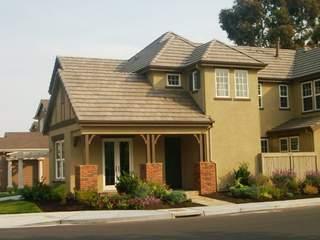 49 Hollyleaf Way Novato, CA 94949 - Photo 1 of 6 a front view of a house with a yard and garage