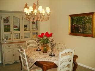 49 Hollyleaf Way Novato, CA 94949 - Photo 2 of 6 a view of a dining room with furniture and chandelier
