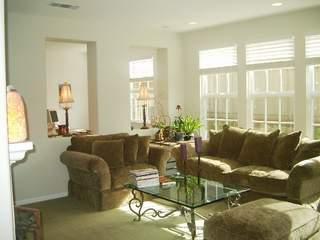 49 Hollyleaf Way Novato, CA 94949 - Photo 4 of 6 a living room with furniture and a large window