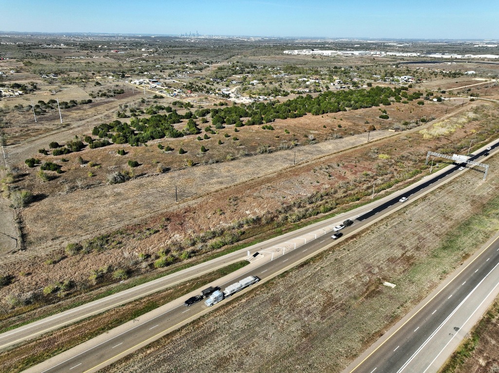 Tbd Tbd Tx-130 Austin, TX 78719 - Photo 5 of 10 a view of roof with wooden floor and city view