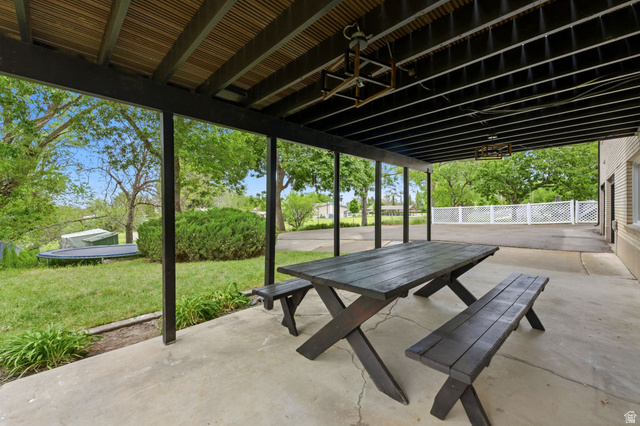 871 Bonita Way Centerville, UT 84014 - Photo 50 of 61 Expansive covered patio featuring a concrete surface and structural support beams