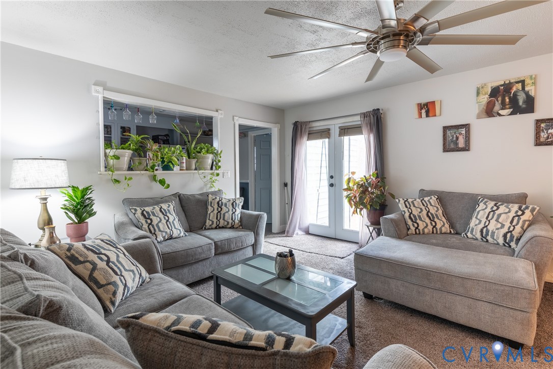 423 Atwater Road Hopewell, VA 23860 - Photo 2 of 14 a living room with furniture and a large window