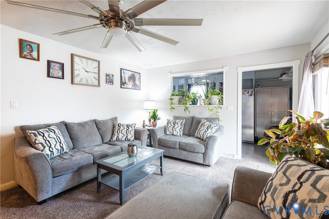 423 Atwater Road Hopewell, VA 23860 - Photo 3 of 14 a living room with furniture and a couch