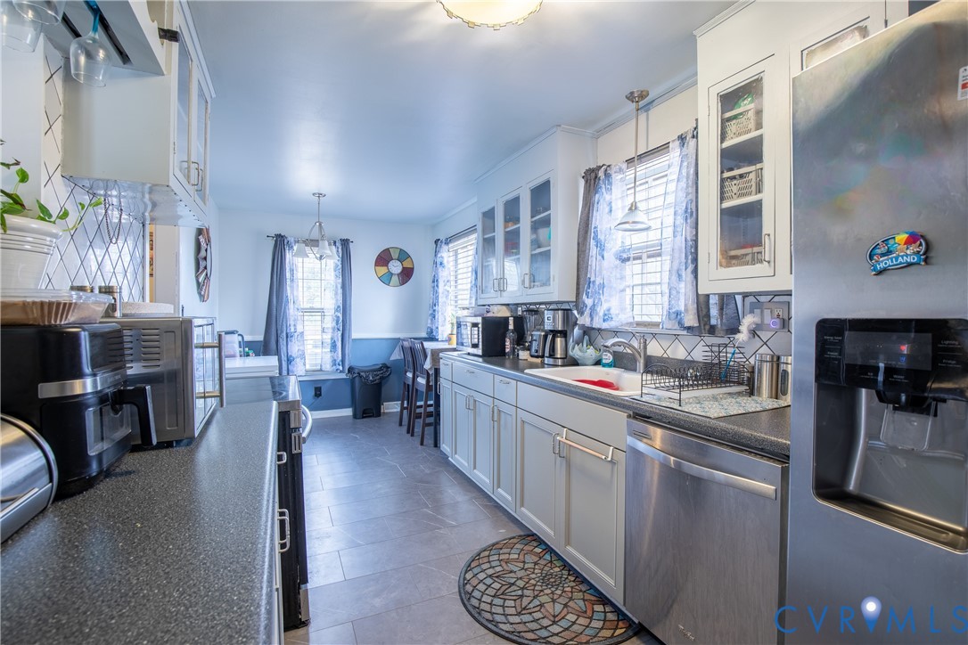 423 Atwater Road Hopewell, VA 23860 - Photo 5 of 14 a kitchen with stainless steel appliances lots of counter top space and furniture
