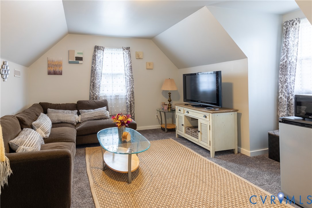 423 Atwater Road Hopewell, VA 23860 - Photo 7 of 14 a living room with furniture and a flat screen tv