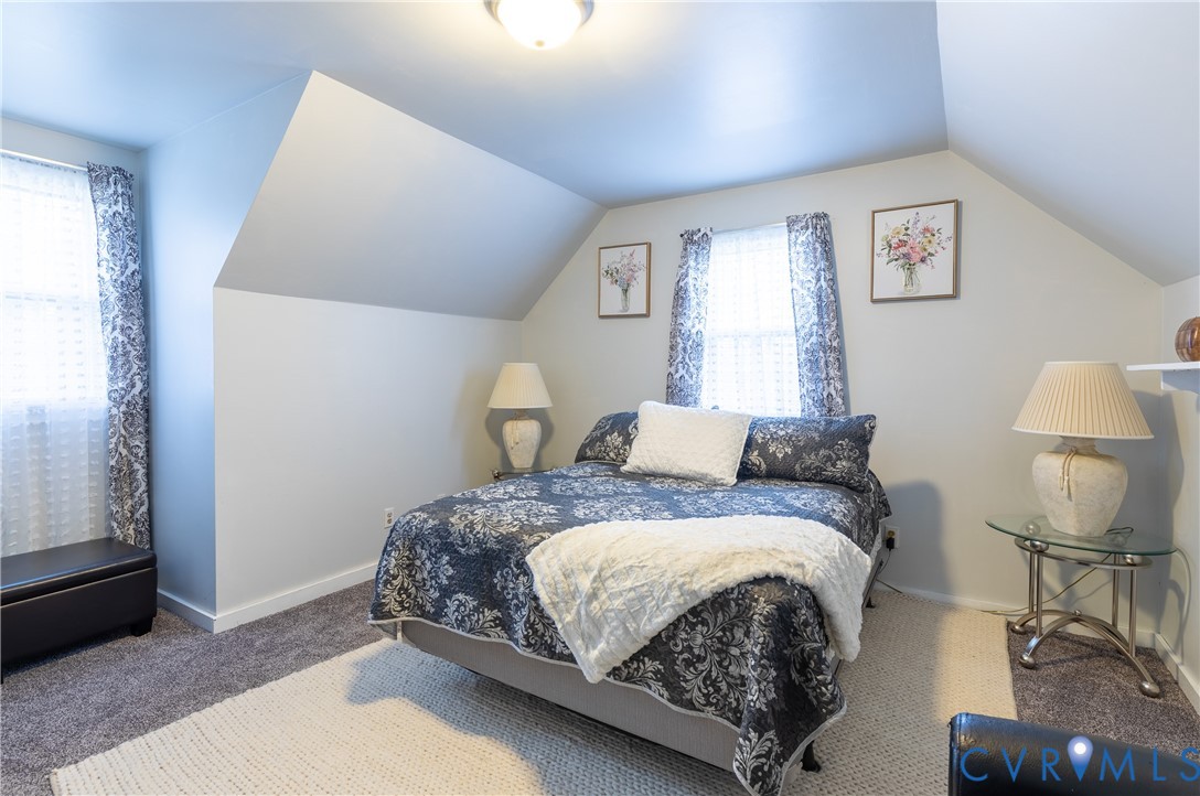 423 Atwater Road Hopewell, VA 23860 - Photo 8 of 14 a bedroom with a bed and window