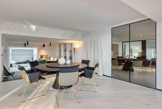 a kitchen with stainless steel appliances granite countertop a stove and a refrigerator