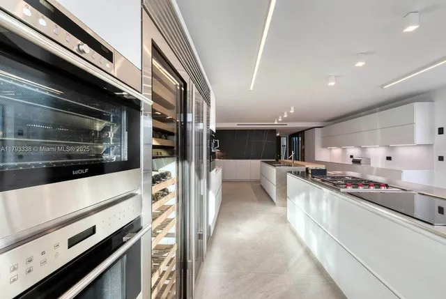 a room with furniture and a chandelier