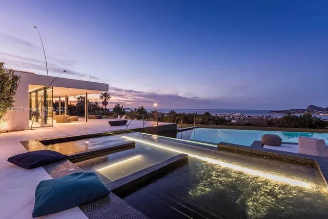 aerial view of a house with a big yard