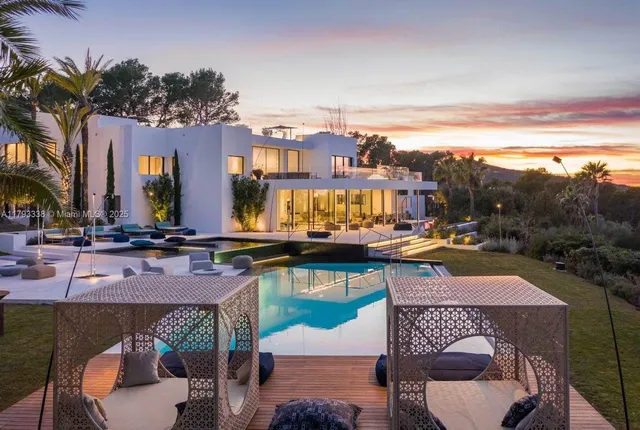 an aerial view of a house with a garden