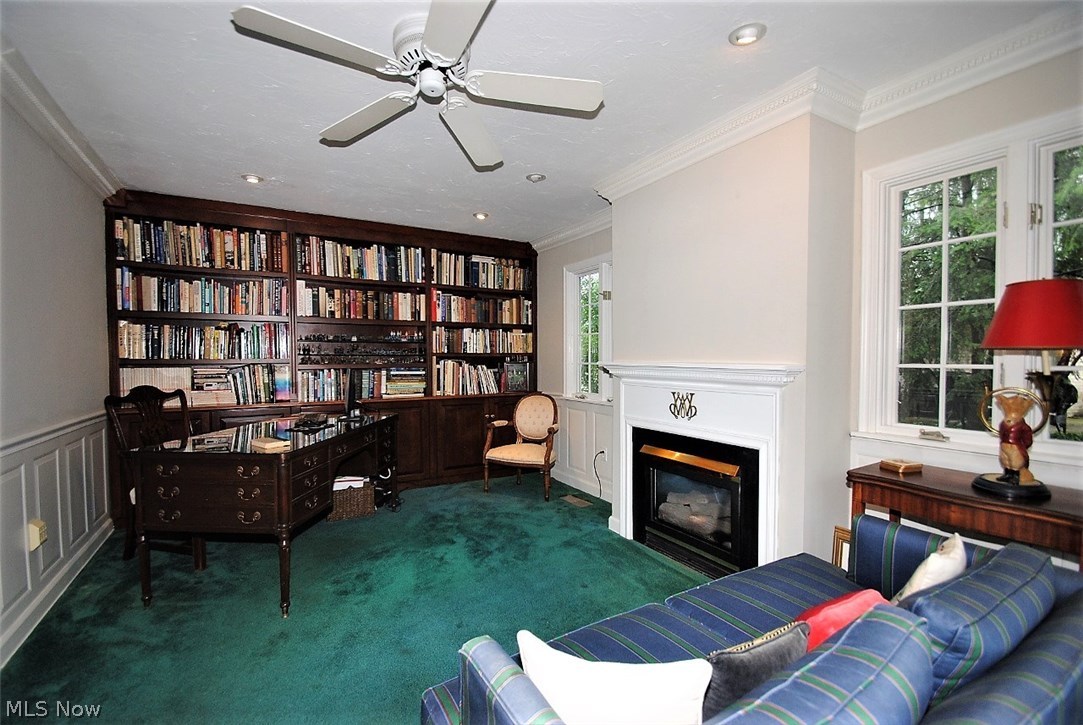2862 Manchester Road Shaker Heights, OH 44122 - Photo 12 of 25 Cozy den with gas fireplace and wall of built ins. Opens to patio