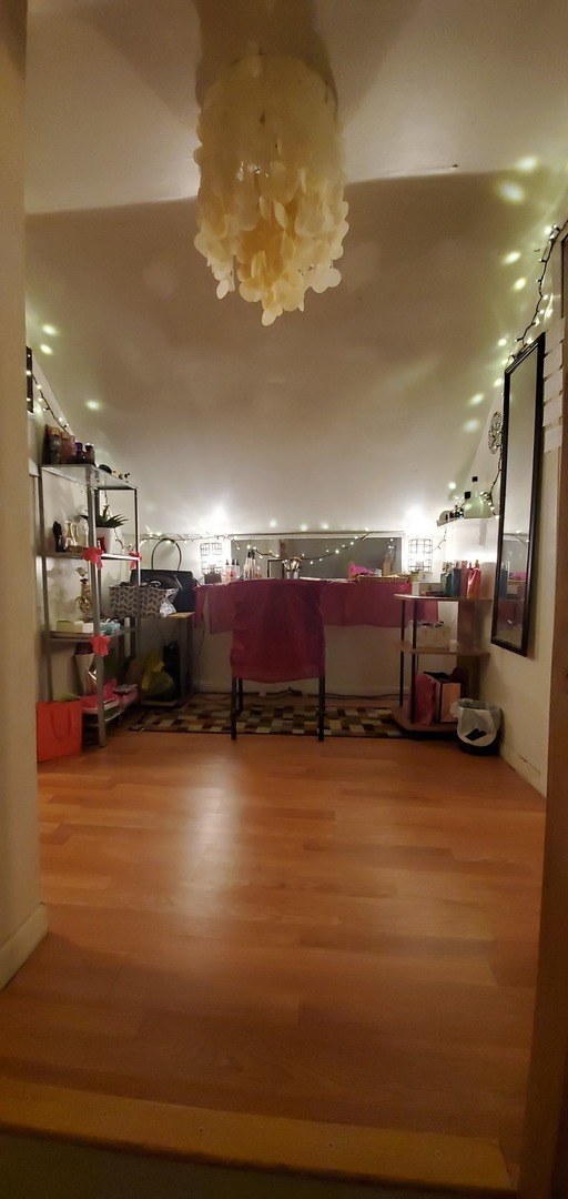 9315 South Clyde Avenue Chicago, IL 60617 - Photo 21 of 32 a view of a room with wooden floor