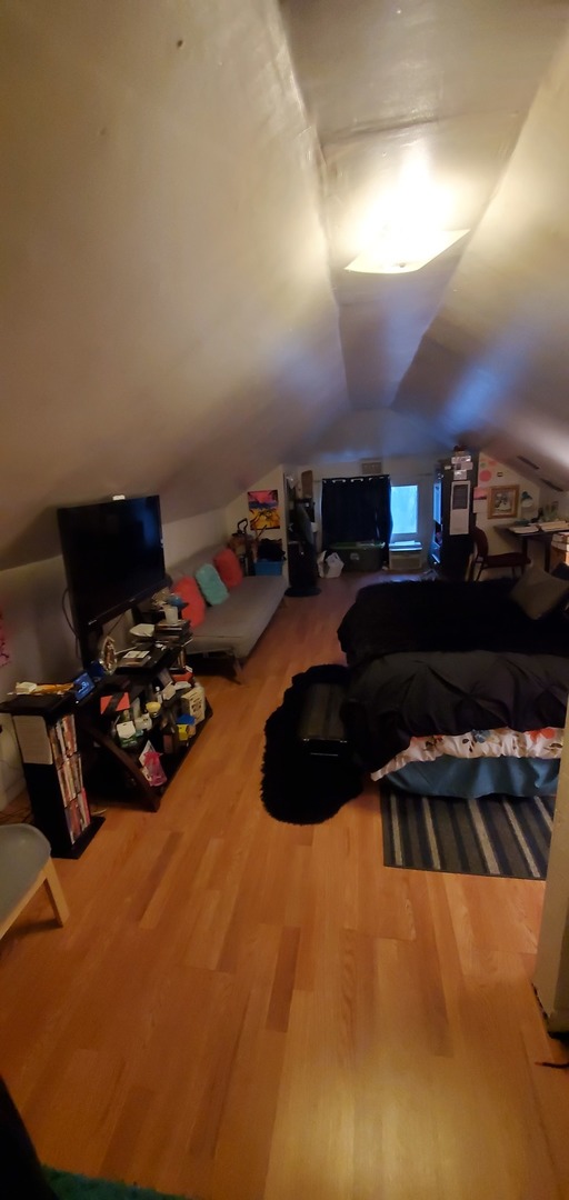 9315 South Clyde Avenue Chicago, IL 60617 - Photo 23 of 32 a kitchen with a stove and a refrigerator
